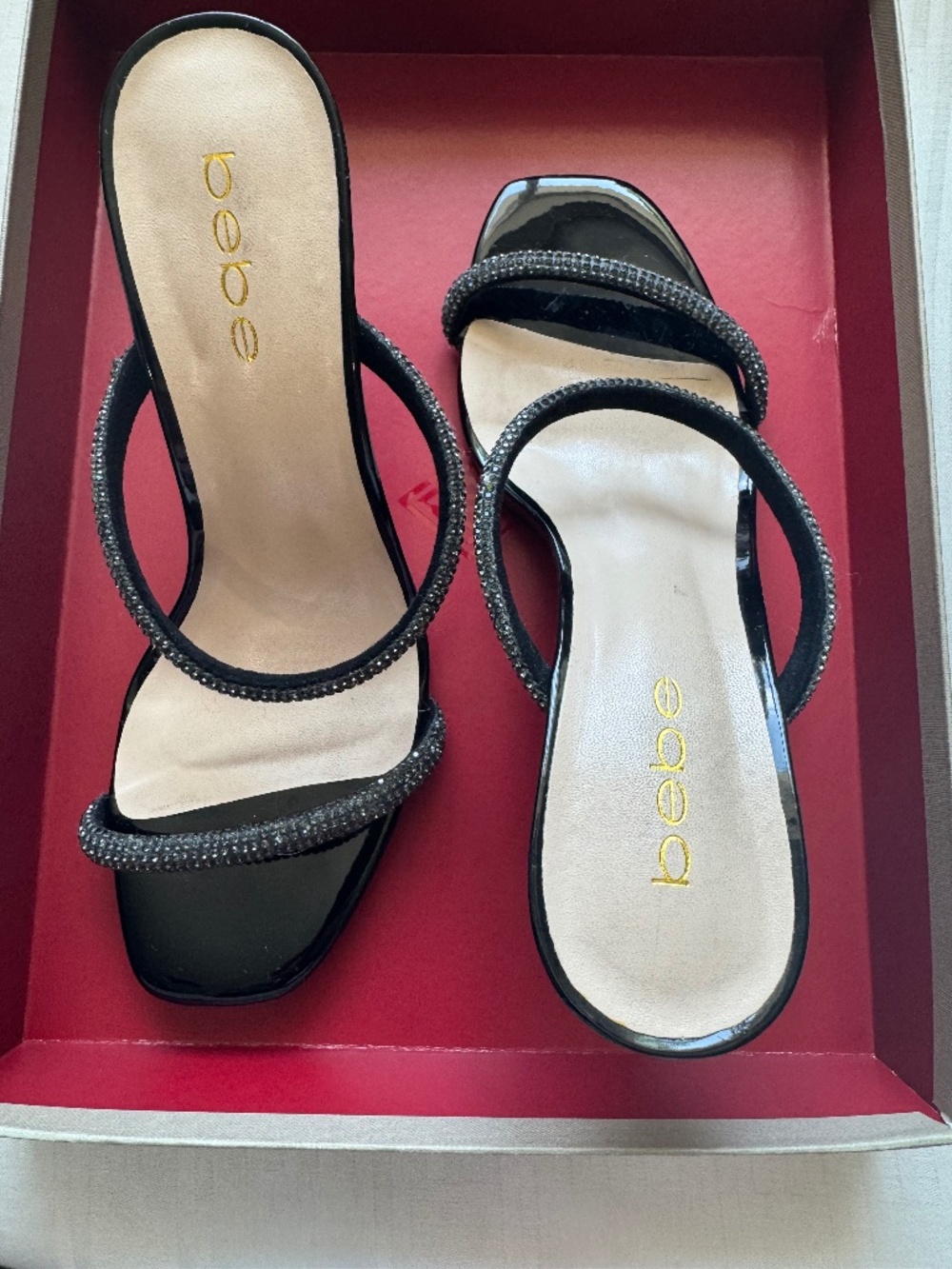 Bebe, Size 8, the heeled sandals are very elegant